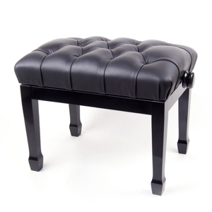 Tabouret de piano capitonné noir avec pieds en bois laqué, design élégant pour salle de musique ou salon.